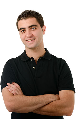 Portrait of website specialist, arms crossed, focused on helping home service businesses look good online.